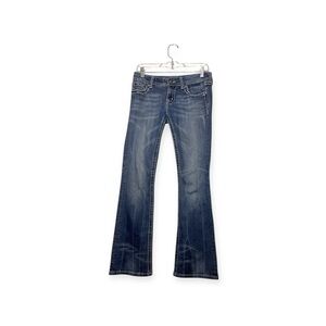 Women’s Miss Me boot cut jeans with back pocket embellishments, size 28